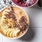 Chocolate smoothie bowl with banana, peanut butter and hemp seeds